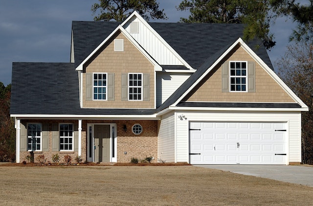 brown%20and%20white%20house%20with%20garage%20door
